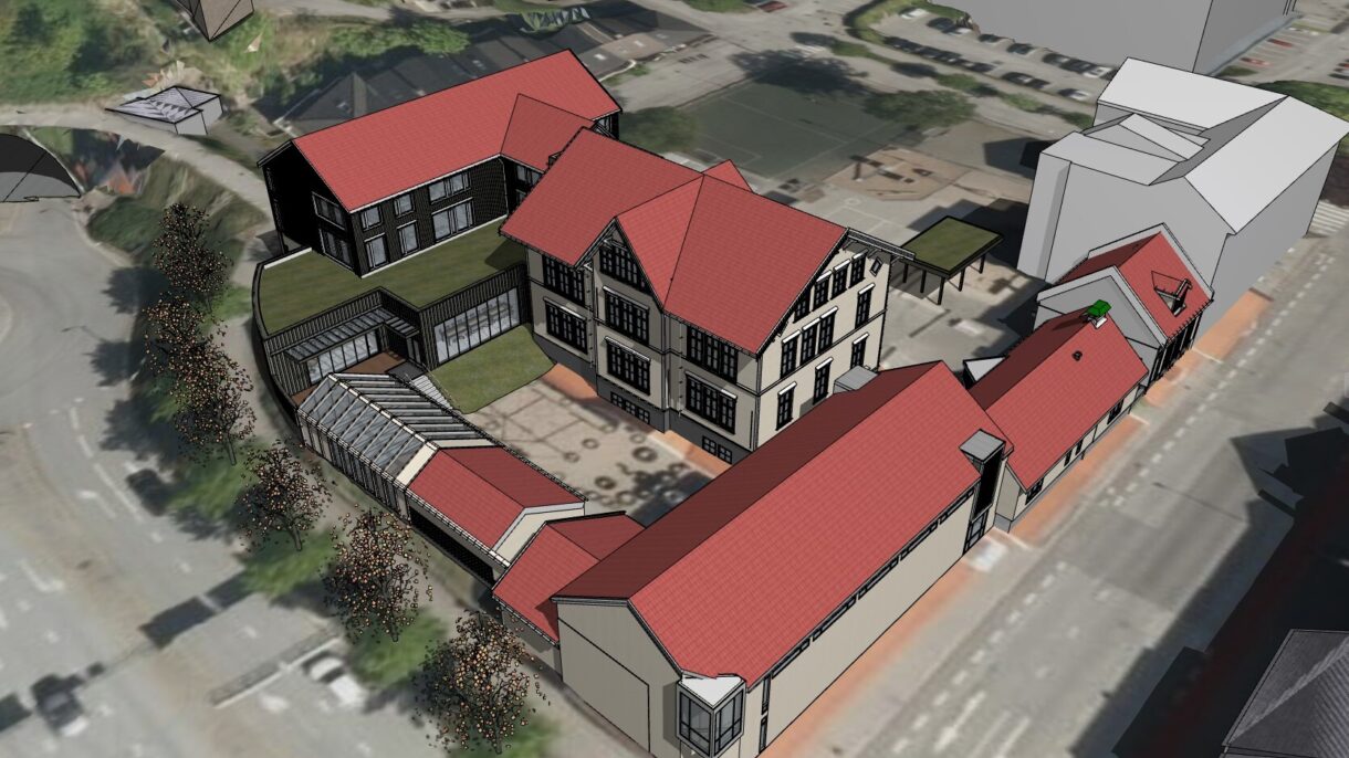Skoleanlegg med bygg og skolegård. Aksonometri.