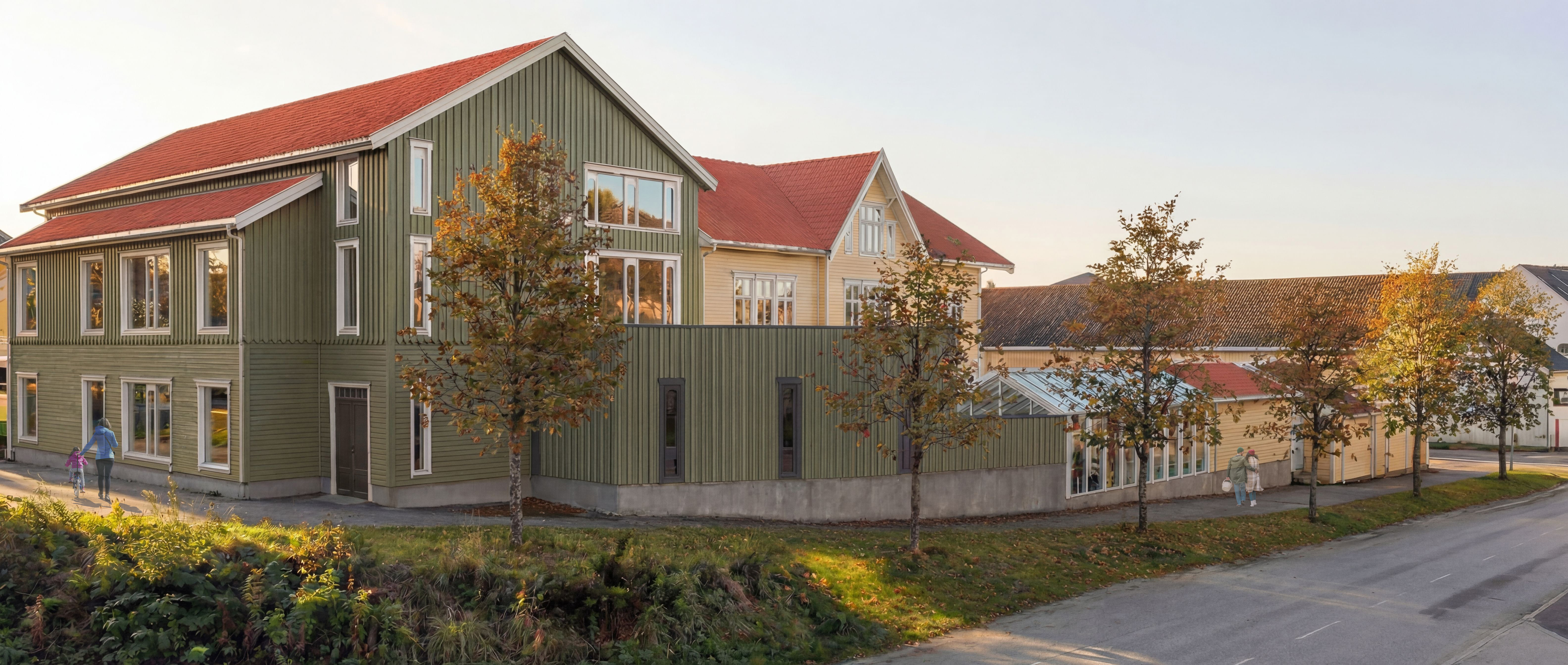 Grønt bygg på tre etasjer på gatehjørne. Illustrasjon.